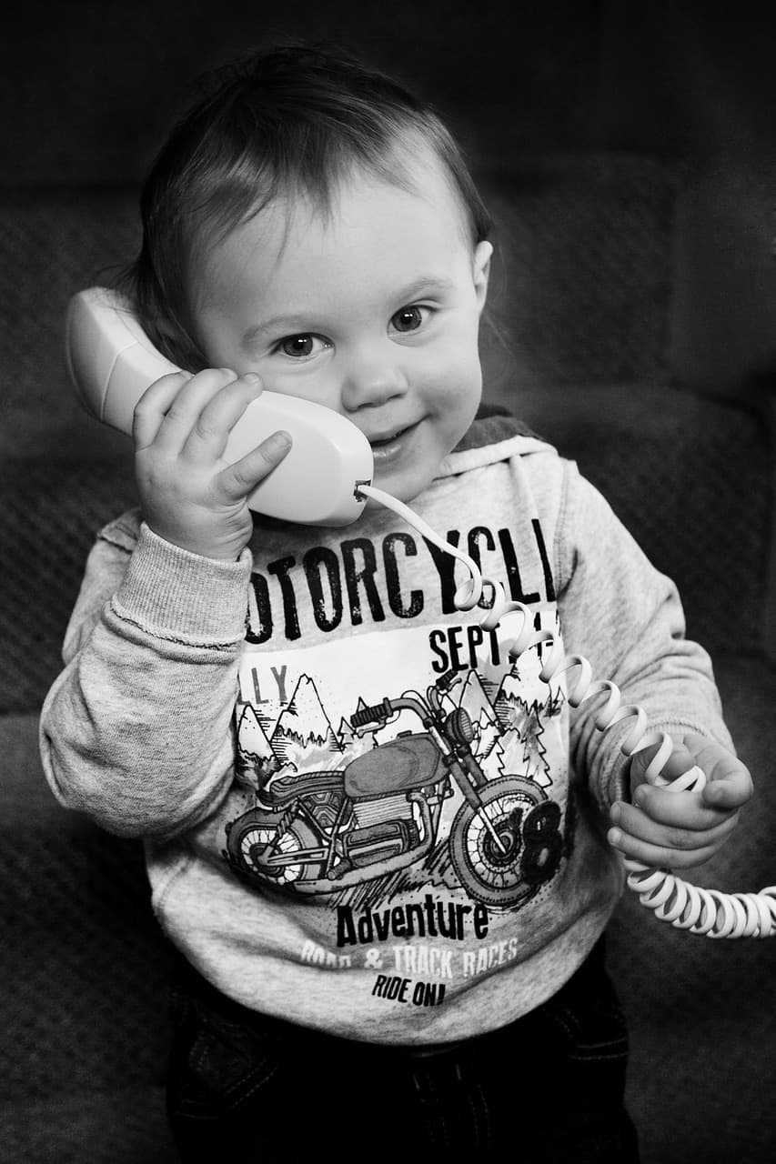 child talking on phone speech delays child speech development